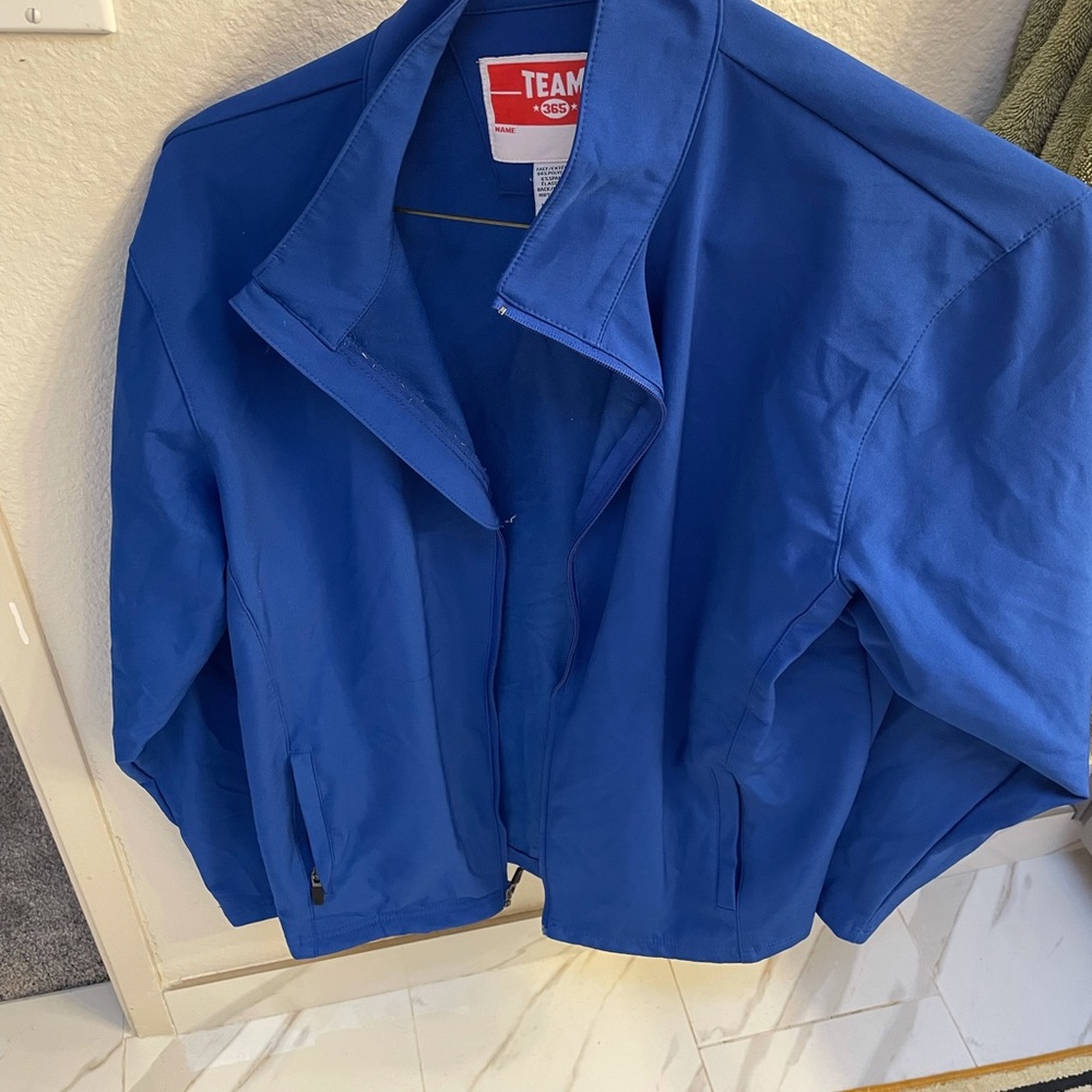 Blue jacket.
